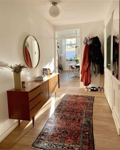 the hallway is clean and ready to be used as a dressing room or office area