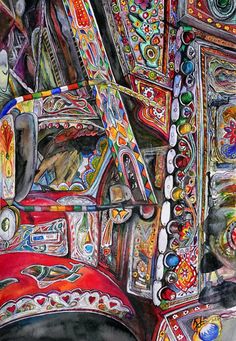 the interior of an old truck painted with many colors and designs on it's sides