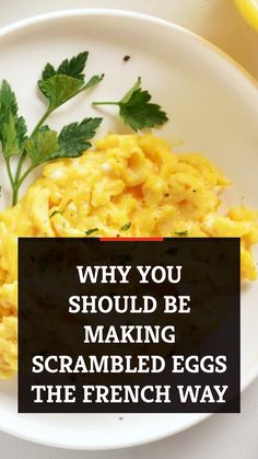 scrambled eggs on a white plate with parsley and lemon wedges next to the words, why you should be making scrambled eggs the french way