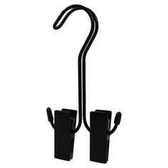 a pair of black metal hooks on a white background