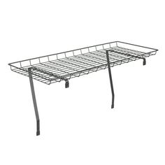 a large metal shelf with two legs and a wire basket on the bottom, against a white background