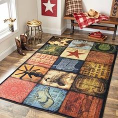 an area rug with many different colors and designs