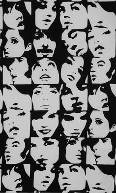 a black and white photo of many different people's faces, with the ruler in front of them