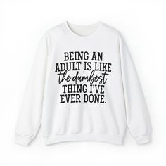 Become a cozy and carefree adult (🤣) with our 'Being an Adult is Like the Dumbest Thing I've Ever Done' sweatshirt. Featuring a 50/50 blend for comfy wear, this medium-weight classic fit sweatshirt perfectly captures the sarcasm and humor of adulting. Funny Slogan Sweatshirt In Relaxed Fit, Funny Text Relaxed Fit Sweatshirt, Inspirational Humor, Comfy Wear, Workout Sweatshirt, Birthday Humor, 50 50, Medium Weight, Dumb And Dumber