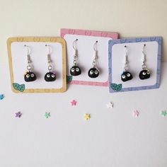 Soot Sprite earrings from the movie Spirited Away. Each one has a colorful star on its head which you can choose or leave it as a surprise. Perfect gift for any fan of the movie!  * Each soot sprite is approx. 1 cm in size. * They are very small and delicate so handle with care.  * All my pieces are handmade so they might be slightly different from the one pictured. Fandom Style Black Jewelry Gift, Black Fandom Jewelry Gift, Black Fandom Inspired Jewelry Gift, Whimsical Black Jewelry For Gifts, Cute Black Earrings For Gifts, Cute Black Earrings For Gift, Cute Black Earrings As A Gift, Cute Black Earrings For A Gift, Handmade Black Novelty Earrings