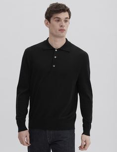 Distinguished by impeccable craftsmanship, our long sleeve Cotton Knit Polo has endless styling potential and lays the foundation for a well-stocked wardrobe. It has a supremely soft handle and comfortable regular fit; finished with ribbed trims, charcoal natural Mother of Peal buttons.

A light-weight knit made from our premium Flamed Mercerized Peruvian Pima cotton yarn, which gives the piece its lustrous appearance. The Mercerization process also increased fiber strength and affinity to dye, Classic Fall Henley With Button Cuffs, Classic Henley With Button Closure For Winter, Classic Winter Henley With Button Closure, Black Wool Sweater For Business Casual, Black Long Sleeve Polo Sweater With Button Closure, Solid Long Sleeve Polo Sweater With Button Closure, Classic Fall Henley For Workwear, Classic Fall Henley For Work, Classic Cashmere Tops With Button Closure