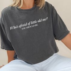 Comfort Colors Shirt, Who's Afraid Of Little Old Me Shirt W H Y - S H O P - W I T H - S W E E T T C A P R I ? We are a husband-and-wife team that designs and prints everything out of our home-based business in Georgia! What does this mean for you? Sometimes our turnaround times may be a little longer compared to other Etsy shops, but we promise that our product stands out above the rest. We pay attention to every detail including the brand of shirts we use, professional equipment & materials... Even down to the packaging, we try to make sure it's not only packaged well & protected from the elements, but fun and exciting to open! We want to make sure you have an A+ shopping experience from start to finish! Our products are made with a high-quality heat transfer vinyl then pressed with a pro Christian Statement Shirt, Simple Christian Tshirts, Church Merch, Uplifting Scripture, Poet Shirt, Faith Tees, Christian Apparel, Comfort Colors Shirt, Simple Graphic