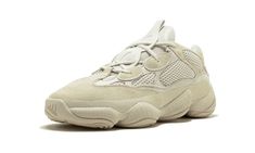 Expanding his adidas Yeezy line even further, Kanye West presents the Yeezy 500 Desert Rat sneaker.  The Desert Rat features a blend of retro and modern, with a chunky Feet You Wear sole unit from the adidas archives and a high-fashion influenced new design up top built in mesh and premium suede.  The adidas Yeezy 500 Desert Rat “Blush” is available here in a clean, minimalist look of tonal light tan from top to bottom—a hue on par with much of Kanye’s Yeezy fashion line. Yeezy 500 Blush, Yeezy Collection, Yeezy Boost 500, Yeezy Fashion, Yeezy 500, Yeezy Sneakers, Buy Shoes Online, Stadium Goods, Adidas Yeezy Boost 350