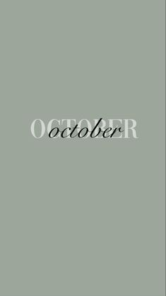 the word october written in black on a gray background