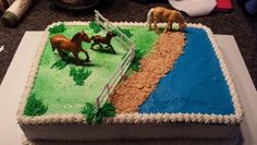 there is a cake with horses on it