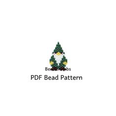 the bead pattern for a christmas tree with an owl on it's head