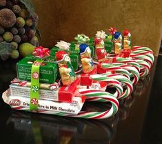 candy canes are lined up on a table