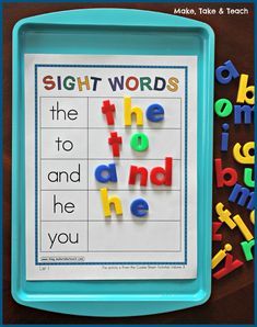 sight words in the shape of letters on a tray