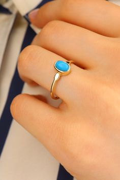 14k Solid Gold Turquoise Stone Ring - Blue Stone Gold Ring - Turquoise Stone Ring - Fine Jewellery -Birthday Gift - Gold Minimalist Ring This solid gold dainty ring is made entirely from 14k solid gold. * Jewelry is packaged and shipped in a delicate jewelry gift box. * If you are purchasing it as a gift, please feel free to add a personal note. Anniversary, Gift For Wife, Christmas Gift Gold Kt: 14K solid gold * Available Gold Color:  * Guaranteed Authentic 14k Gold, Not Plated Or Filled * Stamp: 14K Gold Ring With Blue Stone, Blue Turquoise Ring For Promise, Fine Jewelry Style, Blue Turquoise Ring In 14k Gold, Blue Turquoise 14k Gold Fine Jewelry Ring, 14k Gold Blue Turquoise Ring, Oval Blue Turquoise Ring In 14k Gold, Blue Opal Birthstone Ring In 14k Gold, Blue Turquoise 14k Gold Wedding Ring, Blue Turquoise Ring For Anniversary, Dainty Style