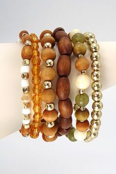 Exude bohemian flair when you wear this wooden bead stretch bracelet set. DIMENSION clasp: Stretchable metal finish: Gold Plating product: Lead & Nickle Compliant anti-tarnish: Double E-coating Wood Bead Bracelet, Gold Bracelet Set, Bohemian Bracelets, Wooden Rings, Beaded Stretch Bracelet, Stretch Bracelet, Wooden Beads, Wood Beads, Stretch Bracelets