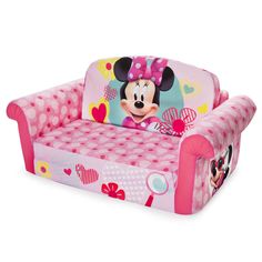 a minnie mouse sofa with pink polka dots