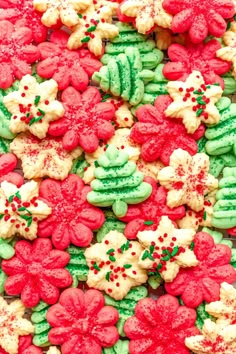 christmas cookies with frosting and sprinkles on top