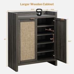 the large wooden cabinet has an open door and is shown with measurements for the doors