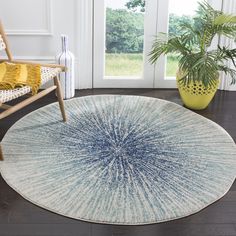 The Evoke Rug Collection is a spectacular fusion of fashion-forward patterns, vibrant colors and plush textures. A classy centerpiece of room decor, Evoke is machine loomed using frieze yarns for high style and high performance in any room of the home or business office. Safavieh Evoke Jude 4 X 4 (ft) Royal/Ivory Round Indoor Abstract Bohemian/Eclectic Area Rug Polyester in Blue | EVK228A-4R Eclectic Area Rug, Area Rug Sets, Bedroom Area Rug, Transitional Rugs, Round Area Rugs, Geometric Area Rug, Ivory Rug, Abstract Rug, Distressed Rugs