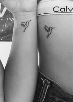 hummingbird | tattoo | ink | art | artwork | ispo | sisters | wrist | rib | black and white | fine line | small | summer vibe | skin | artist | body art | body | image | two | matching | relationship | meaningful | Best Friend Hummingbird Tattoos, Hummingbird Matching Tattoo, Bird Friend Tattoo, Matching Hummingbird Tattoos, Hummingbird Tattoo Black, Plant Tattoo, Friendship Tattoos, Mother Tattoos