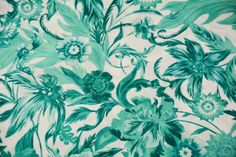 a green and white floral print fabric