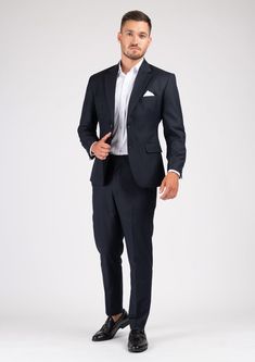 The Astor Dark Navy Twill Suit is an elegant and timeless professional wardrobe staple. Versatile for a variety of occasions, get ready to look your best in this custom made suit, wherever you wear it. Elegant Semi-formal Pantsuit With Pressed Crease, Elegant Suits With Notch Lapel, Elegant Tailored Suit, Elegant Formal Blazer With Suit Collar, Professional Single Breasted Suiting Fabric Sets, Professional Single-breasted Suiting Fabric Set, Elegant Custom Fit Three-piece Suit With Welt Pockets, Semi-formal Custom Fit Set With Notch Lapel, Custom Fit Notch Lapel Set For Semi-formal Occasion