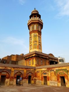 an old building with a clock tower on top