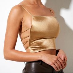 Ozka Crop Top In Satin Gold No Longer Sold! Super Cute Satin Gold Cropped Top. Has A Square Neckline And A Open Back With Criss-Crossed Lacing. Perfect For A Night Out! Brand New With Tags-Never Worn! Size M Brand: Motel Rocks Ntw Originally $47 Tags: Motel Rocks Princess Polly Urban Outfitters Pacsun Crop Top Satin Gold Square Neckline Sexy Cute Clubbing Club Party Lace Up Streetwear Rave Festival Concert Corset Bodice Cami Tank Glam Top Gold Outfit, Gold Top Outfit, Thrift Bundle, Crop Top Satin, Gold Crop Top, Red Slip Dress, Top Satin, Festival Concert, Long Sleeve Dress Formal