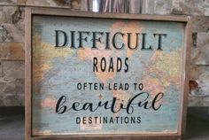 a sign that says difficult roads often lead to beautiful destinations