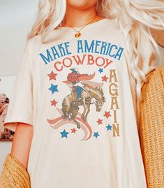 This Gender-Neutral Adult Graphic Tees item by WildSageClothingCo has 26 favorites from Etsy shoppers. Ships from El Paso, TX. Listed on May 29, 2023 Patriotic Western Outfit, 4th Of July Graphics, Western T Shirts, Make America Cowboy Again, Golden Sky, Cowboy Print, Christian Shirts Designs, Western Tee, Western Vibes