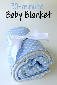 a baby blanket with the words 30 minute baby blanket on it and an image of a blue polka dot