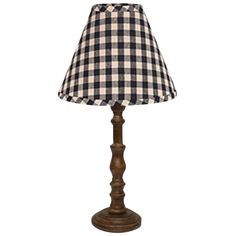 a lamp with a black and white checkered shade