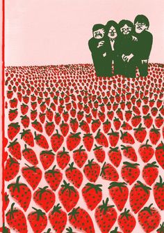 two men standing in front of a field of strawberries