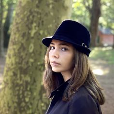 Black trilby hat made with rabbit fur felt velour. Finished with a ribbon of the same felt with a small and beautiful silver buckle. This stylized hat is one of my favourite handmade piece with a beautiful silhouette. The hat has the characteristic of a male hat, but is perfectly suitable for women. The measurements in centimeters are 25 x 23. Crown hight 10. Brim lengthin front 5. (These measurements may vary slightly depending on the size of the hat) For its elaboration we only use hoods and c Winter Evening Fedora With Short Brim, Black Fur Felt Hats For Party, Classic Black Fur Felt Cloche Hat, Fur Felt Cloche Hat For Kentucky Derby, Kentucky Derby Fur Felt Cloche Hat With Short Brim, Black Fur Felt Cloche Hat With Short Brim, Black Fur Felt Cloche Hat With Wide Brim, Black Fur Felt Wide Brim Cloche Hat, Fur Felt Hat With Short Brim For Party