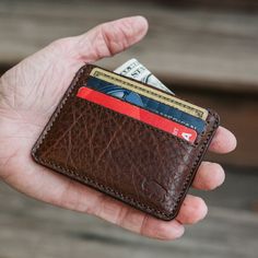 Detail - Slim Leather Wallet and Credit Card Slots Rustic Leather Wallets With Card Slots, Rustic Leather Wallets, Rugged Bifold Wallet For Everyday Use, Rugged Brown Wallet For Everyday Use, Rustic Bifold Wallets For Everyday Use, Distressed Brown Leather Wallet For Everyday Use, Brown Textured Leather Wallet For Everyday Use, Distressed Brown Rectangular Wallet For Everyday Use, Everyday Leather Wallets With Leather Patch