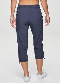 The Prime Anywhere Cargo Capri is a relaxed fit lightweight stretch woven pant that is an essential part of an athleisure wardrobe. Lightweight stretch woven fabric allows you to move without restriction, while moisture wicking properties help it to dry quickly to keep you dry and comfortable. Sizable side pockets and additional small cargo pocket provide convenient on-the-go storage, and an elastic waistband and drawstrings at the waist and leg openings allow for a more customized fit. These ca Athleisure Wardrobe, Cargo Pocket, Golf Outfit, Black And Navy, Athleisure, Moisture Wicking, Woven Fabric, Capri Pants, Capri