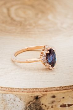 Product Details Ring Style:The "Dahlia" is an Art Deco-style lab-created alexandritewomen's engagement ring with delicate and ornate details and is available with many center stone options Center Stone: 10x5mm Marquise-Cut Lab-Created Alexandrite Materials: 14K rose gold engagement ring featuring a lab-createdalexandrite center stone and 1/5 CTW diamond accents Customizable:Because each ring is handcrafted to order, wecan customize yours using unique materials, gemstones, or design features. Con Chatham Alexandrite, Staghead Designs, Alexandrite Engagement Ring, Ring With Diamond, Ceramic Rings, Detailed Ring, Rose Gold Engagement, Handcrafted Rings, Unique Materials