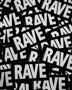 some black and white stickers are stacked together on top of each other, with the words rave printed on them