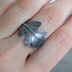 "This wonderful large leaf ring is fully handmade of solid sterling silver. Realistic gorgeous oak leaf, such an eye cather! If you prefer vintage rustic look, the ring can be darkened for you. The leaf is 1.7 cm wide at the widest part and the ring will be made to your size. Your custom made ring will be prepared and shipped in 7 business days. SIZE: Silver leaf: 1.7 cm wide Ring width: 3 mm (half round) MATERIAL: Sterling silver  PLEASE NOTE: Every piece of jewelry ordered from my store is shi Plant Ring, Plant Rings, Botanical Ring, Leaves Ring, Silver Leaf Ring, Nature Inspired Rings, Silver Leaves, Witchy Jewelry, Leaf Jewelry