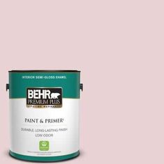 a can of behr paint sitting on top of a white table with the words behr next to it