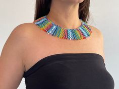 These magnificent necklaces come from the Embera indigenous community and are created with great mastery. They come from the Choco province on the Colombian Pacific coast and represent a point of convergence between European, African and Amerindian culture.  Of these handmade pieces, not two are alike. Each purchase helps empower these masterful artisans. Artisan Multicolor Boho Collar Necklace, Multicolor Boho Collar Jewelry As A Gift, Multicolor Boho Collar Jewelry Gift, Multicolor Boho Collar Jewelry For Gift, Multicolor Handwoven Southwestern Necklaces, Southwestern Style Handwoven Multicolor Necklaces, Southwestern Style Multicolor Handwoven Necklace, Indigenous Community, Santa Fe Nm