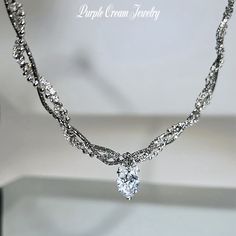 A necklace with a ribbon and heart motif zirconia pendant top♡

 This is a unique chain that consists of three types of chain: snake, ball, and rhinestone.

 Comes with a long adjuster so you can adjust the length.



 Color: Silver

 Chain length: approx. 40cm (+ 5cm adjuster)

 Pendant size: approx. 1.5cm x 1.1cm

 Material: Zinc alloy



 As this is an imported product, please refrain from purchasing if you are sensitive or looking for perfection. Elegant Rhinestone Heart Pendant Necklace For Party, Elegant Crystal Heart Pendant Rhinestone Necklace, Elegant Crystal Rhinestone Heart Pendant Necklace, Elegant Rhinestone Crystal Necklace With Heart Pendant, Elegant Heart-shaped Rhinestone Necklace For Parties, Elegant Crystal Rhinestone Necklace For Valentine's Day, Elegant Rhinestone Necklace For Valentine's Day Anniversary, Elegant Crystal Rhinestone Heart Necklace, Elegant Heart-shaped Cubic Zirconia Rhinestone Necklace