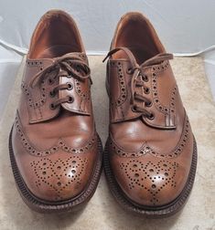 Pair vintage tan brown leather men's shoes, size 9 by Trickers and in beautiful condition. Inside they say Bench Made by Trickers As I'm sure you know, Trickers make fabulous shoes and their bench made models are just the very best - these shoes retailed for many £hundreds. I have owned these shoes for 20 years or more - I acquired a collection of vintage shoes and never wore most of them, just enjoyed owning them. I have worn these I think twice and they are very comfortable. They are top, top Vintage Low-top Leather Shoes With Brogue Detailing, Vintage Brown Low-top Oxfords, Vintage Brogue Leather Low-top Shoes, Vintage Low-top Oxfords With Rubber Sole, Retro Brown Wingtip Leather Shoes, Vintage Lace-up Leather Shoes With Brogue Detailing, Vintage Lace-up Leather Shoes, Vintage Wingtip Leather Shoes, Vintage Goodyear Welted Lace-up Leather Shoes