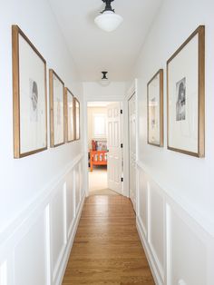 the hallway is clean and ready to be used as a home decorating area for guests