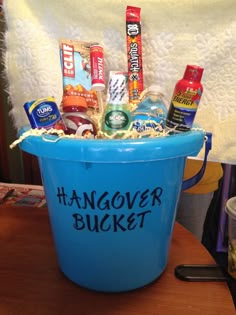 a blue bucket filled with lots of food