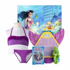 the little mermaid swimsuit is next to a doll