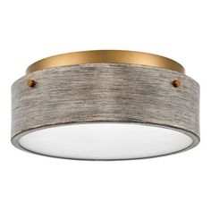 an image of a ceiling light with wood and metal trims on the bottom half