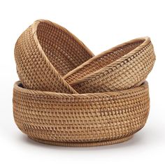 three wicker baskets stacked on top of each other