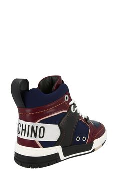 Unmissable branding stamps this sporty high-top sneaker crafted in Italy from colorblocked faux leather. Synthetic upper/textile lining/rubber sole Made in Italy Designer Shoes High Top Sneaker, Moschino, High Top, Designer Shoes, Nordstrom Rack, High Top Sneakers, Rubber Sole, In Italy, Faux Leather