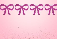 pink bows are hanging on a clothes line with glittery sparkles in the background